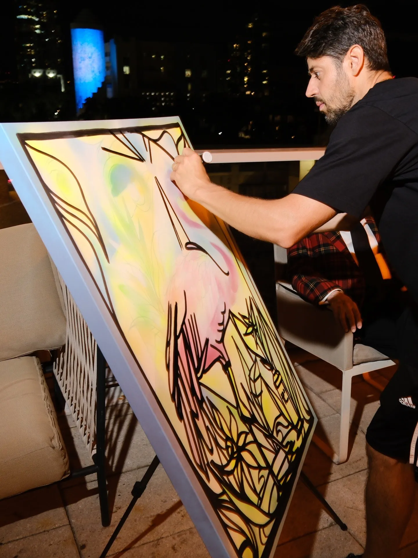 An artist painting live